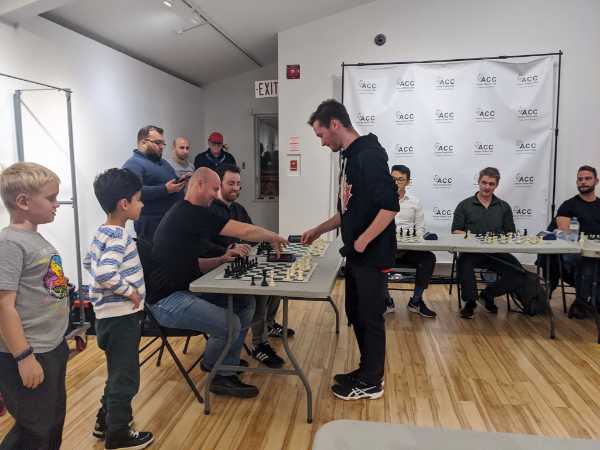 Giving a simul at Annex Chess Club (photo: Melanie Directo)